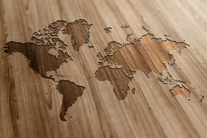 World Map on Wooden Background